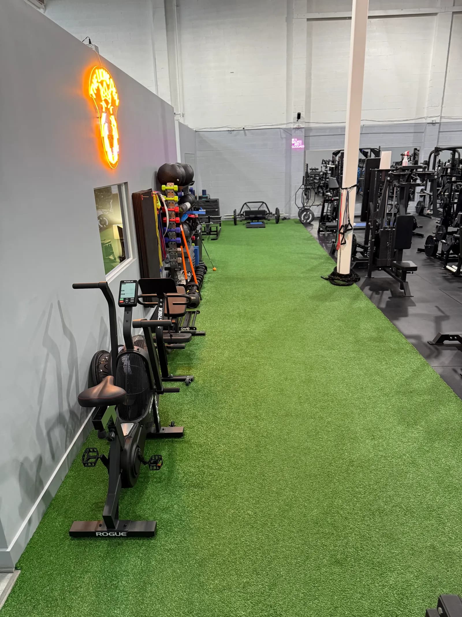The actual private turf and strength equipment inside The Lions Den Boca