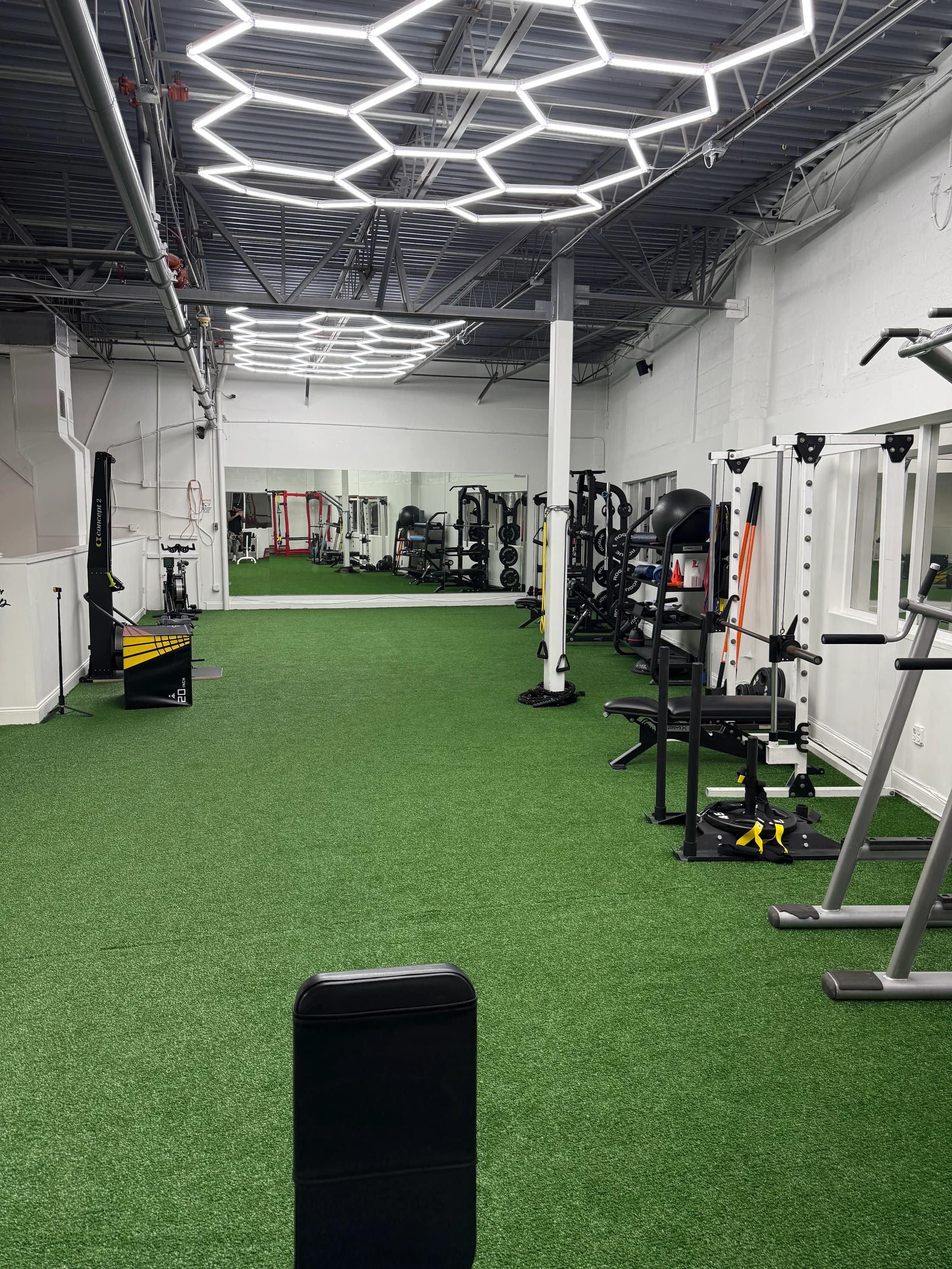 The actual private turf and strength-training area inside The Lions Den Boca